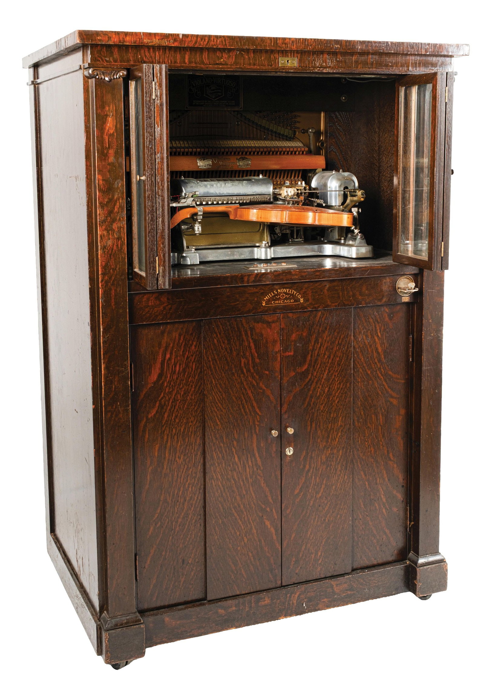 5¢ MILLS NOVELTY. CO. VIOLANO-VIRTUOSO MUSIC PLAYER: C. 1915, The Mills Novelty Co., Chicago, Illinois. Only 4,000 to 5,000 of these Mills Violano-Virtuoso music machines were made, this one made after 1912. It is a stunning piece of workmanship featuri