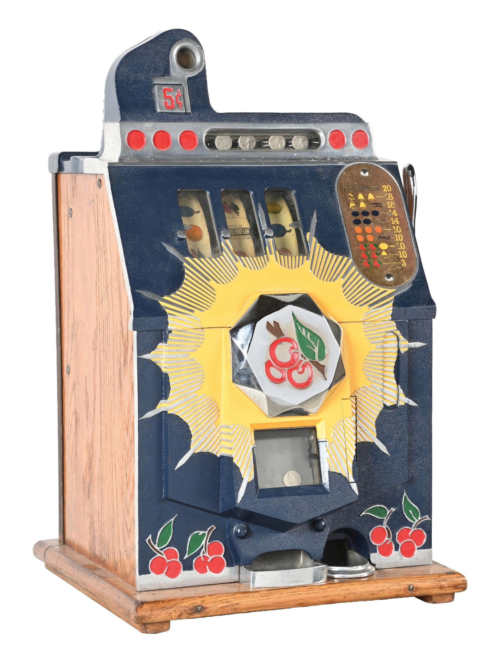 5¢ MILLS NOVELTY CO. BURSTING CHERRY SLOT MACHINE: CONDITION: Showing an older restoration with original reel strips, award card, and back door. New paint and plating. Correct cash box. Plays and pays perfectly, including the jackpot. This is not a st