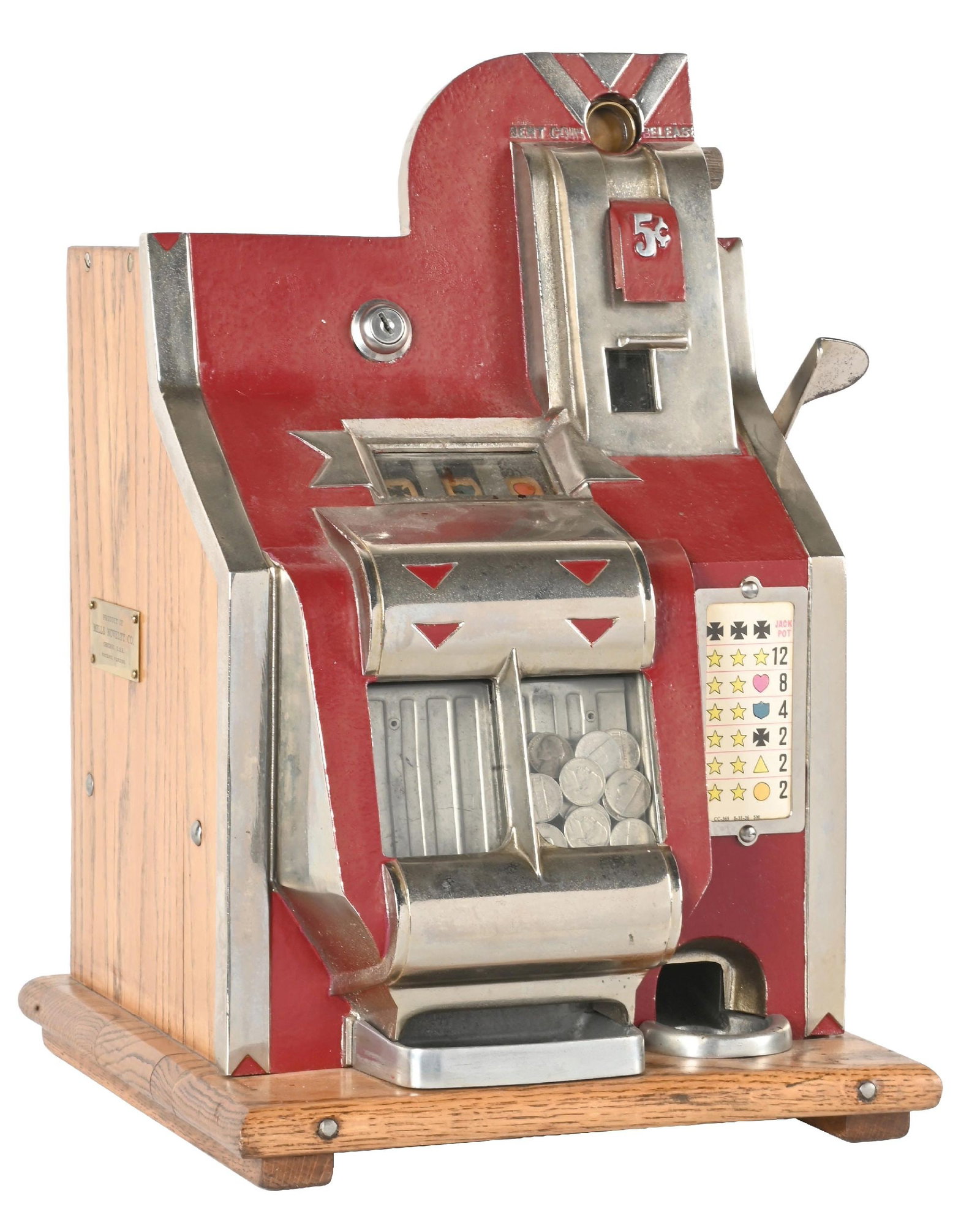 5¢ MILLS NOVELTY CO. QT CHEVRON SLOT MACHINE: CONDITION: Showing an older restoration with original reel strips and award card. New paint and plating and a damaged cash box. Plays and pays correctly including the jackpot. Condition: (Good). Dimen