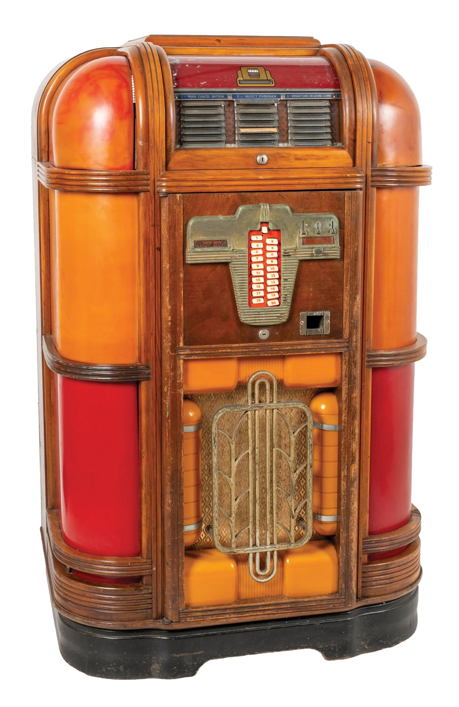 ROCK-OLA MODEL ST-39 JUKEBOX: C: 1939. CONDITION: This Standard Luxury Light-up jukebox offers 20 selections of 78 rpm records. Showing original plastics and veneer, with tabed selector and patina metal components. A Nice original