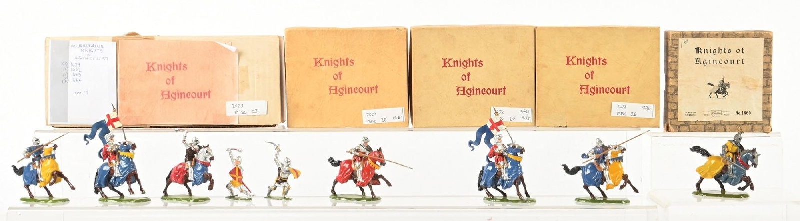 LOT OF 5: W. BRITAIN KNIGHTS OF AGINCOURT SETS: (A) Knights of Agincourt figures No. 1659, 1662, 1663, and 1664 in incorrect box. (B) Set Nos. 9495, 1661, 9496, and 1660 in original boxes. Slight bending and scuffing to all, but all are intact. Con