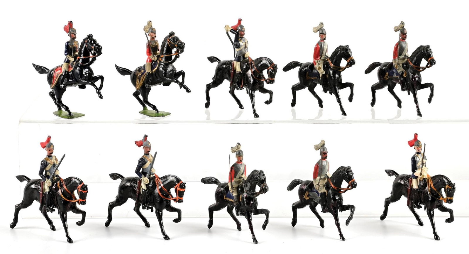 W. BRITAIN'S LIFE AND HORSE GUARDS: Early, pre-war. (A) Germanic Lifeguards with tin swords. 5 pieces. (B) Horse guards, 2 with tin swords. 5 pieces. 10 pieces total. Condition: Dimensions: Largest: 3" x 3".