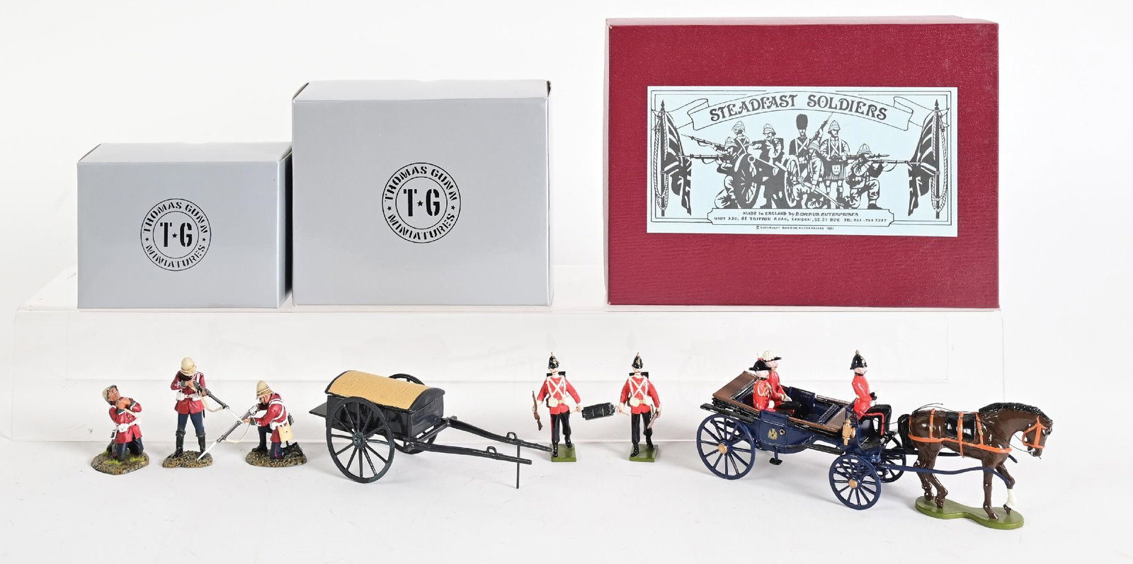 LOT OF 4: BRITISH VICTORIAN ARMY: (A) Thomas Gunn 54th Regiment Zulu War No. SFA007. 2 pieces. (B) Thomas Gunn 54th Regiment Zulu War No. SFA006B. 1 piece. (C) Steadfast Military Landau No. SF87. Includes Wagon, Horse, and Riders. 5 p
