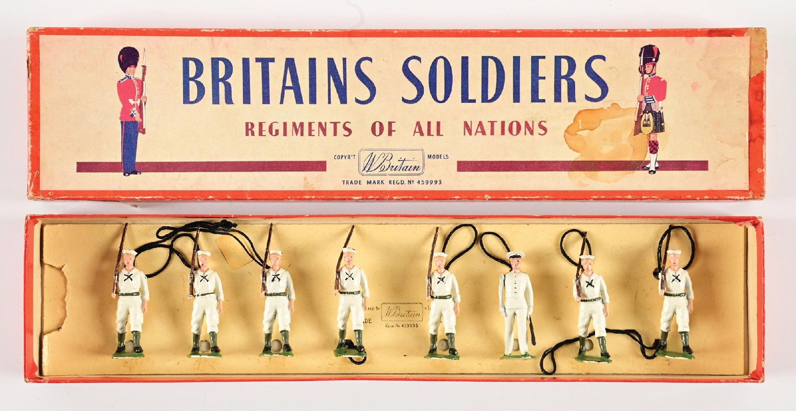 W. BRITAINS UNITED STATES NAVY WHITEJACKETS MARCHING WITH OFFICER SET NO. 1253 IN BOX: Loose in box with tie card. Average condition box. 8 pieces. Condition: Dimensions: Box: 14 - 3/4" x 3 - 1/2" x 1 - 1/8".