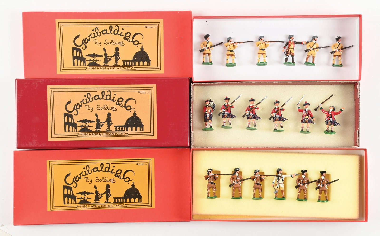 LOT OF 3: GARIBALDI EARLY AMERICANS: (A) British Trappers. 6 pieces. (B) Fort Montgomery Officer and Piper No. B18. 6 pieces. (C) Canadians Firing and Advancing No. F2. 6 pieces. 18 pieces total. Condition: Dimensions: Largest Box: 13" x
