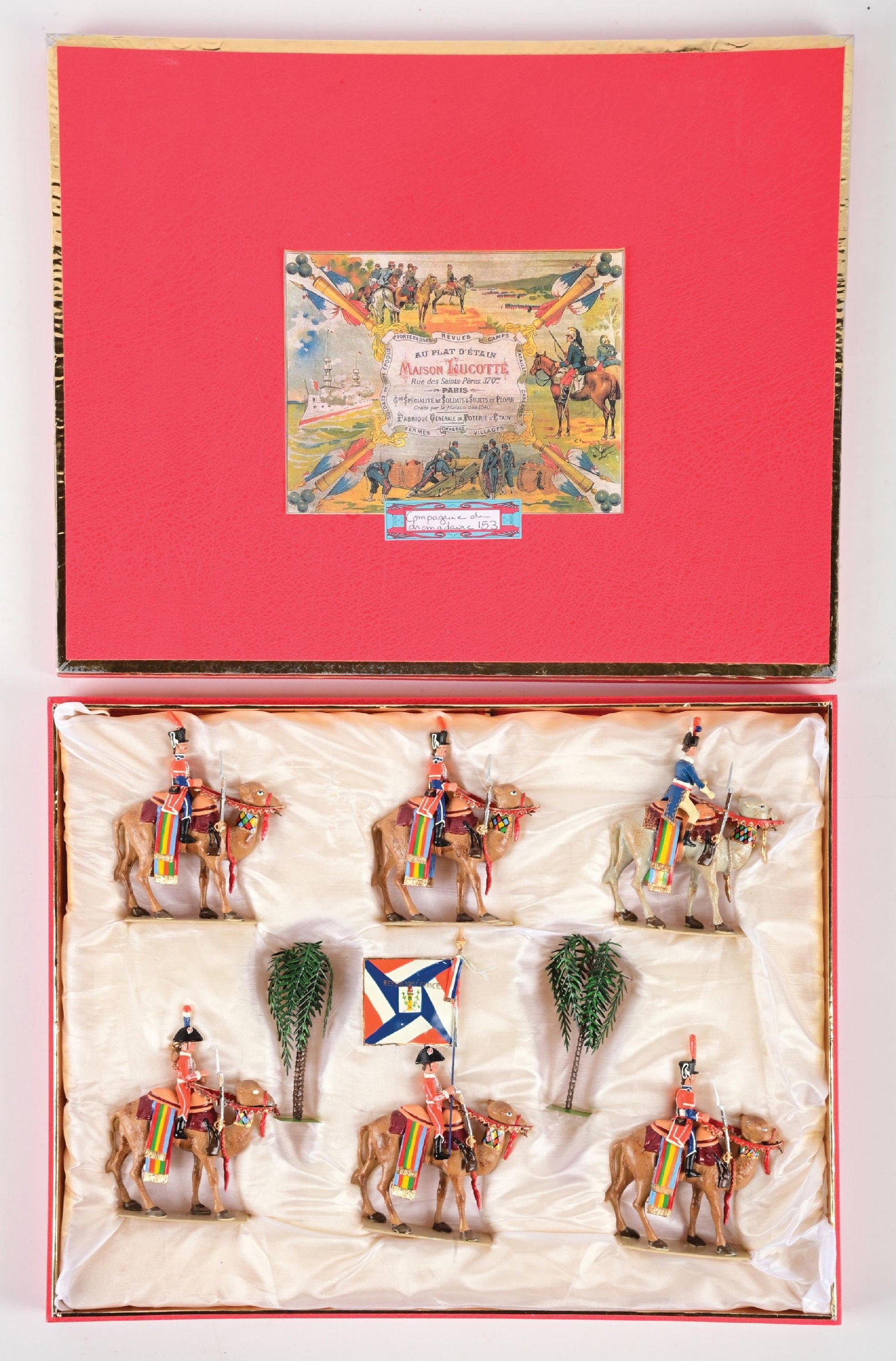 LUCOTTE EGYPTIAN CAMPAIGN: Napoleonic Camel Corps with standard, palm trees, and insert. Bends and chipping on flag. 8 pieces. Condition: Dimensions: 15 - 3/4" x 12 - 1/4" x 2".