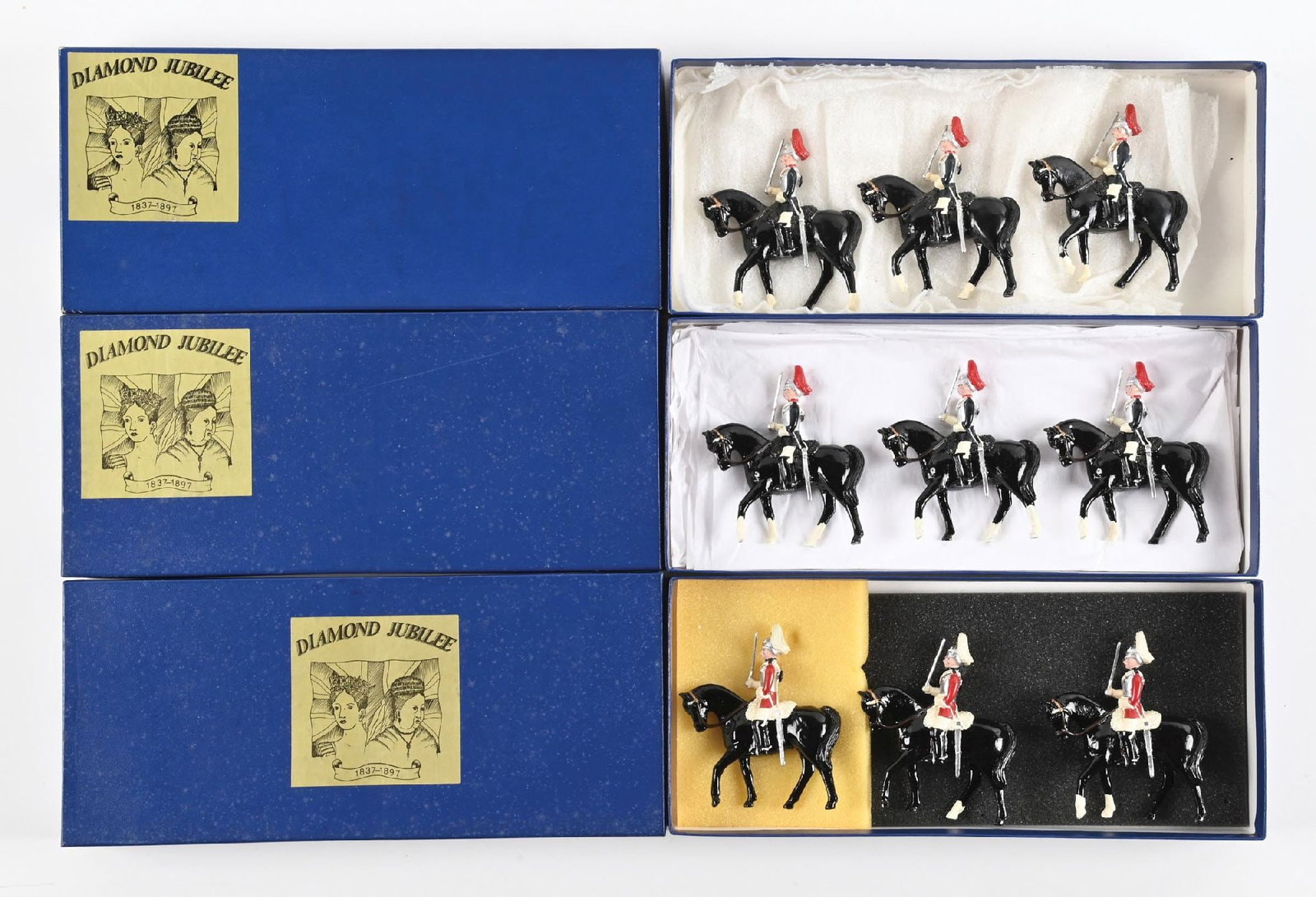 LOT OF 3: MARLBOROUGH DIAMOND JUBILEE: (A) Household Cavalry Royal Horse Guard Troopers No. J3C. (B) Royal Horse Guards No. J3C. (C) Life Guards No. J3A. 3 pieces each. 9 pieces total. Condition: Dimensions: Each Box: 11 - 1/4" x 5" x 1 - 