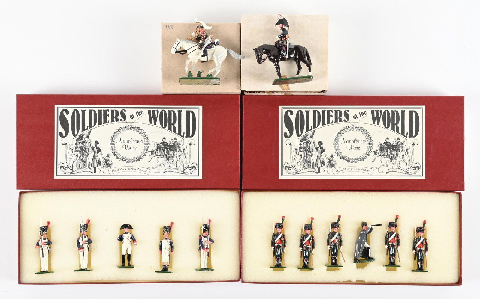 LOT OF 4: SOLDIERS OF THE WORLD NAPOLEONIC TOY SOLDIERS SETS IN BOXES: Lot consists of set Nos. N443 and N326, along with two additional Cavalry: the Duke of Wellington and a Carabiner Bugler. 14 pieces total. Condition: Dimensions: Largest Box: 12 - 1/4" x 5 - 1/4" x 1 