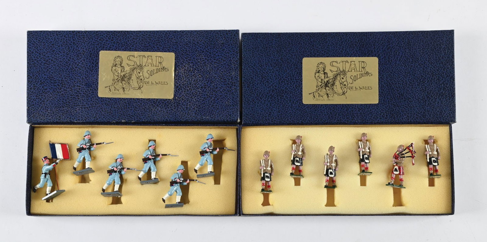 LOT OF 2: STAR/TROPHY ASSORTMENT: (A) Trophy French Advancing. 6 pieces. (B) Star Black Watch Marching 1899 No. 2. 6 pieces. 12 pieces total. Condition: Dimensions: Each Box: 11 - 1/4" x 5" x 1 - 1/2".