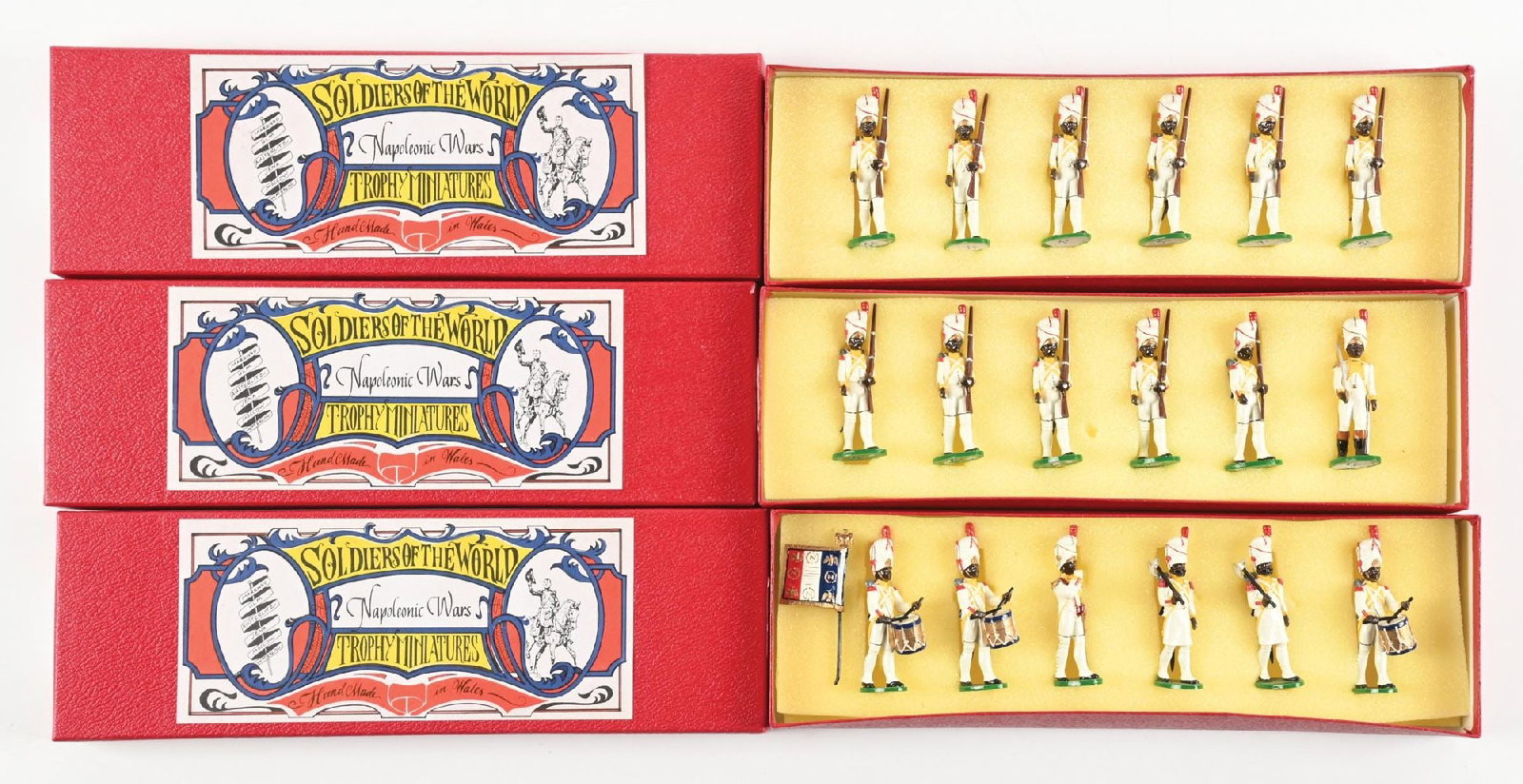 LOT OF 3: TROPHY MINIATURES NAPOLEONIC WARS: (A) Royal African Regiment with NCO No. NP17N. (B) Royal Africa Regiment with Officer No. NP17. (C) Royal Africa Regiment with Drums & Pioneers No. NP17S. Condition: Dimensions: Each Box: 12 - 1/2" x 