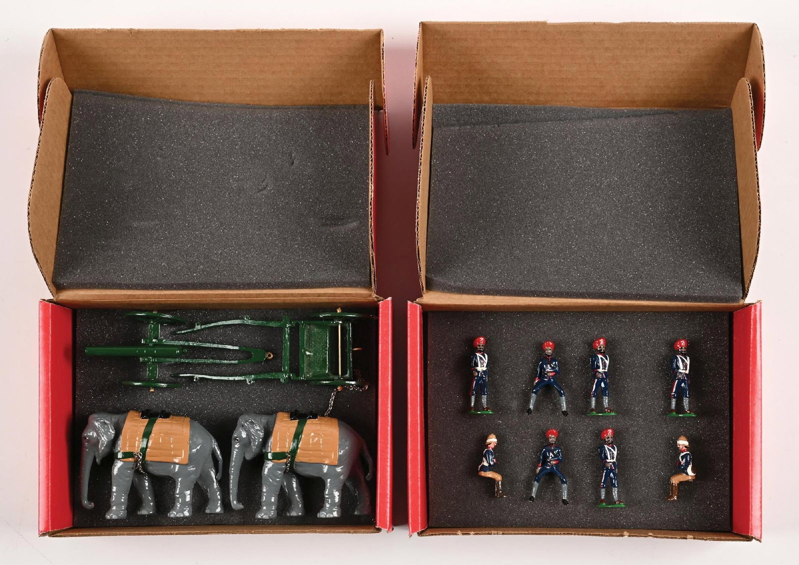 LOT OF 2: TROPHY TOY SOLDIER SETS IN BOXES: Indian Army Elephant-Drawn Caisson and Cannon with Crew. Incorrect boxes. Excellent condition. 11 pieces total. Condition: Dimensions: Each Box: 10" x 7" x 3".