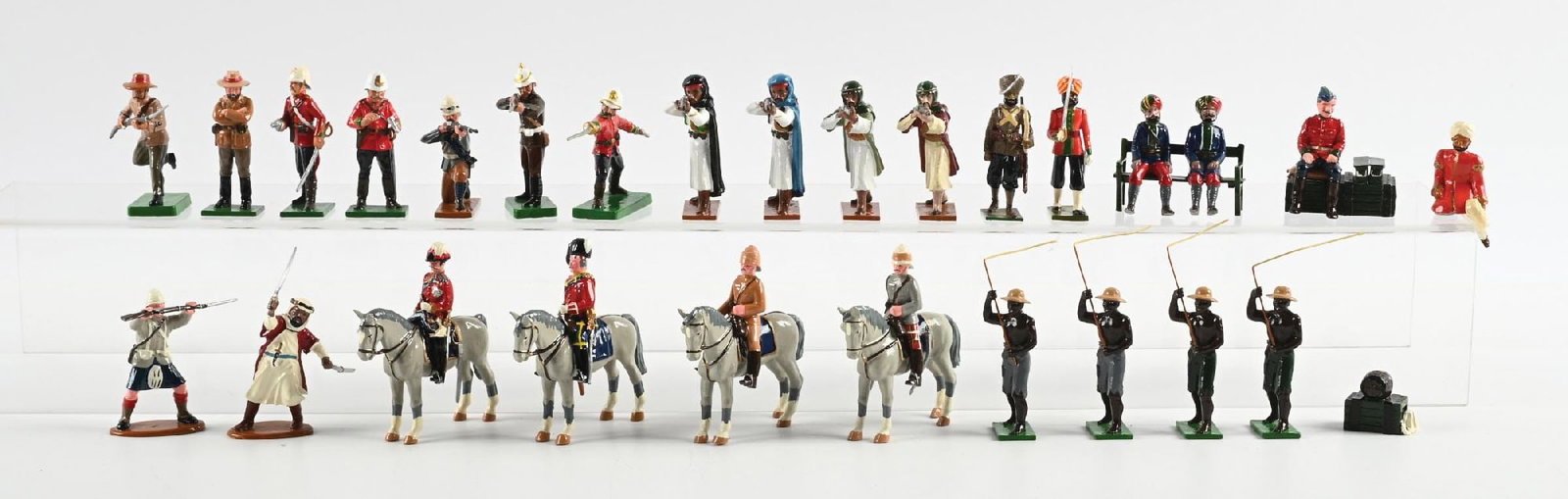 TROPHY MINIATURE MILITARY ASSORTMENT: Includes 4 Mounted Officers, Arabs, Parade Figures. Various wars. Not in original box. 26 pieces. Condition: Dimensions: Box: 17" x 16 - 1/4" x 3".