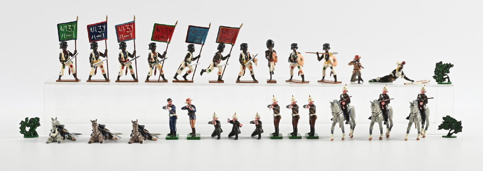 TROPHY MINIATURES AFRICAN WARS ASSORTMENT: Includes Fuzzy-Wuzzies, Natal Guards, Zulus, and foliage. No original box. 30 pieces. Condition: Dimensions: Box: 17" x 16 - 1/4" x 3".