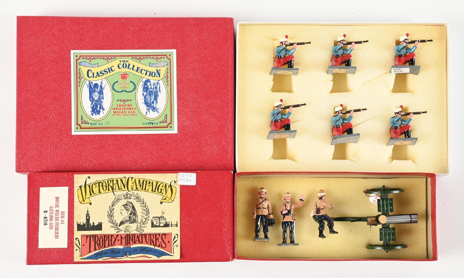 TROPHY MINIATURES BOXER REBELLION: (A) Royal Welsh Fusilers with Gatling Gun No. BEQ44. 4 pieces. (B) Marines Kneeling and Firing. 6 pieces. Box missing label. 10 pieces total. Condition: Dimensions: Largest Box: 9 - 1/4" x 6 - 3/4" x