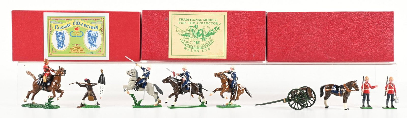 TROPHY MINIATURES ZULU WARS: (A) HZ 23 Mounted Infantry with Zulu. 3 pieces. (B) ZS31 Mounted Lancers. 6 pieces. (6) Water wagon with Troops. 4 pieces. All in boxes, one box has no label. 13 pieces total. Condition: Dimensions: E