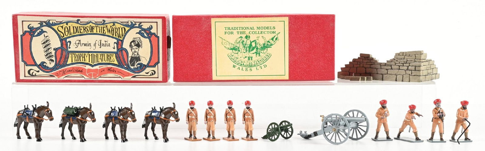 TROPHY MINIATURES INDIAN ARMY: (A) Indian Gun Emplacement EQ47. 6 pieces. (B) Indian Army Mountain Artillery PW7. Boxed. 10 pieces. 16 pieces total. Condition: Dimensions: Largest Box: 9 - 1/4" x 3 - 3/4" x 3 - 1/2".
