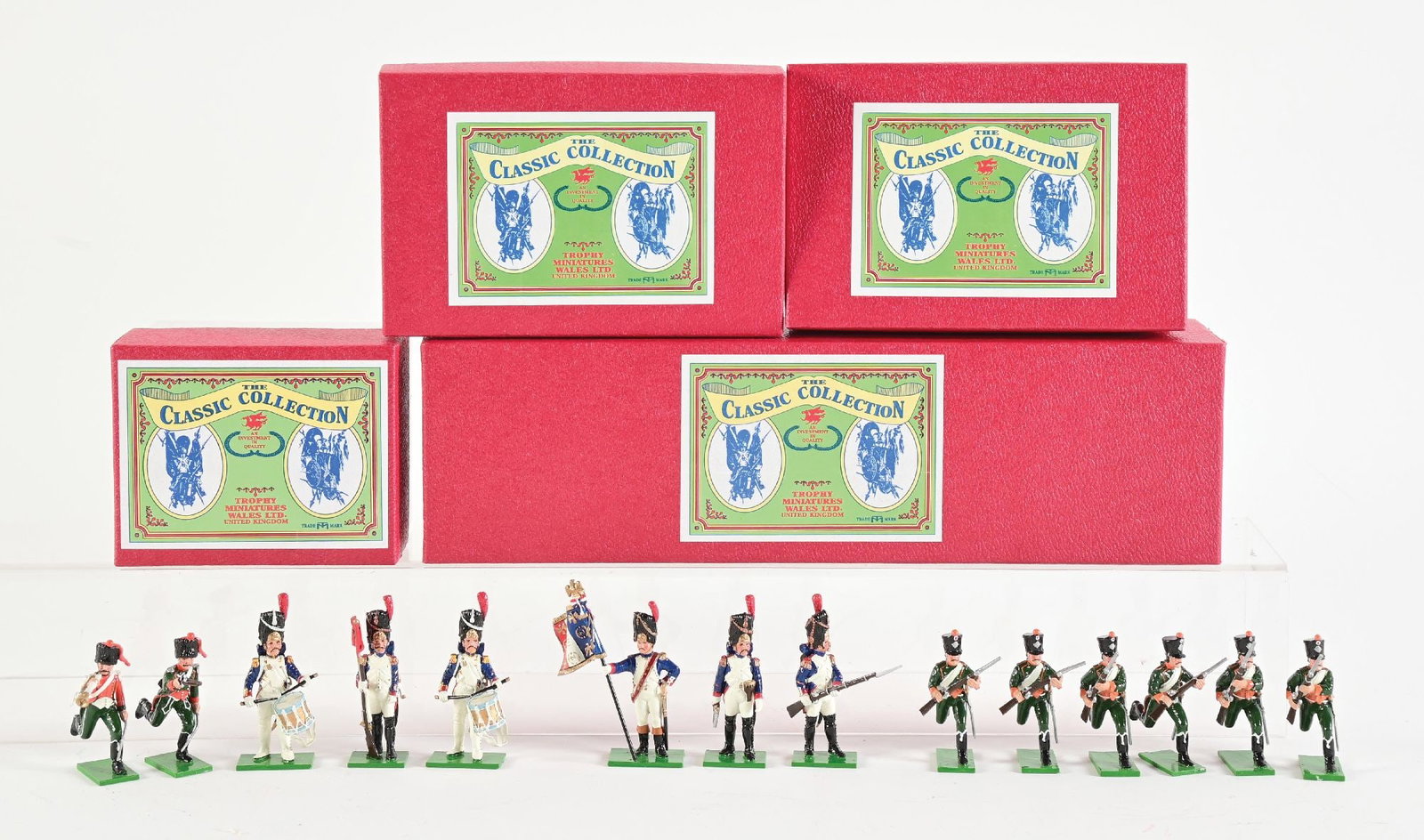 LOT OF 4: TROPHY MINIATURES NAPOLEONIC WARS: (A) Dismounted Chasseurs, 13th Regiment No. NC2A. 2 pieces. (B) Eagle Bearer and Escort No. WA65, Officer and two Sergeants. 3 pieces. (C) The Company Flag and Drummers No. WA66. 3 pieces. (D) Dismoun
