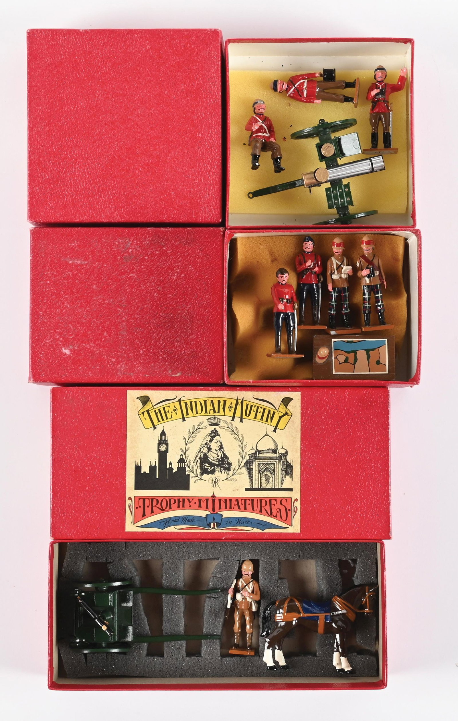 LOT OF 3: TROPHY SETS IN BOXES: (A) Gatling Gun with 3-Man Crew. 4 pieces. (B) Headquarters Table with 4 Officers. 5 pieces. (C) Horse-drawn Maxim Gun on Limber. 3 pieces. Condition: Dimensions: Largest Box: 8 - 1/2" x 3 - 3/4" x 2 