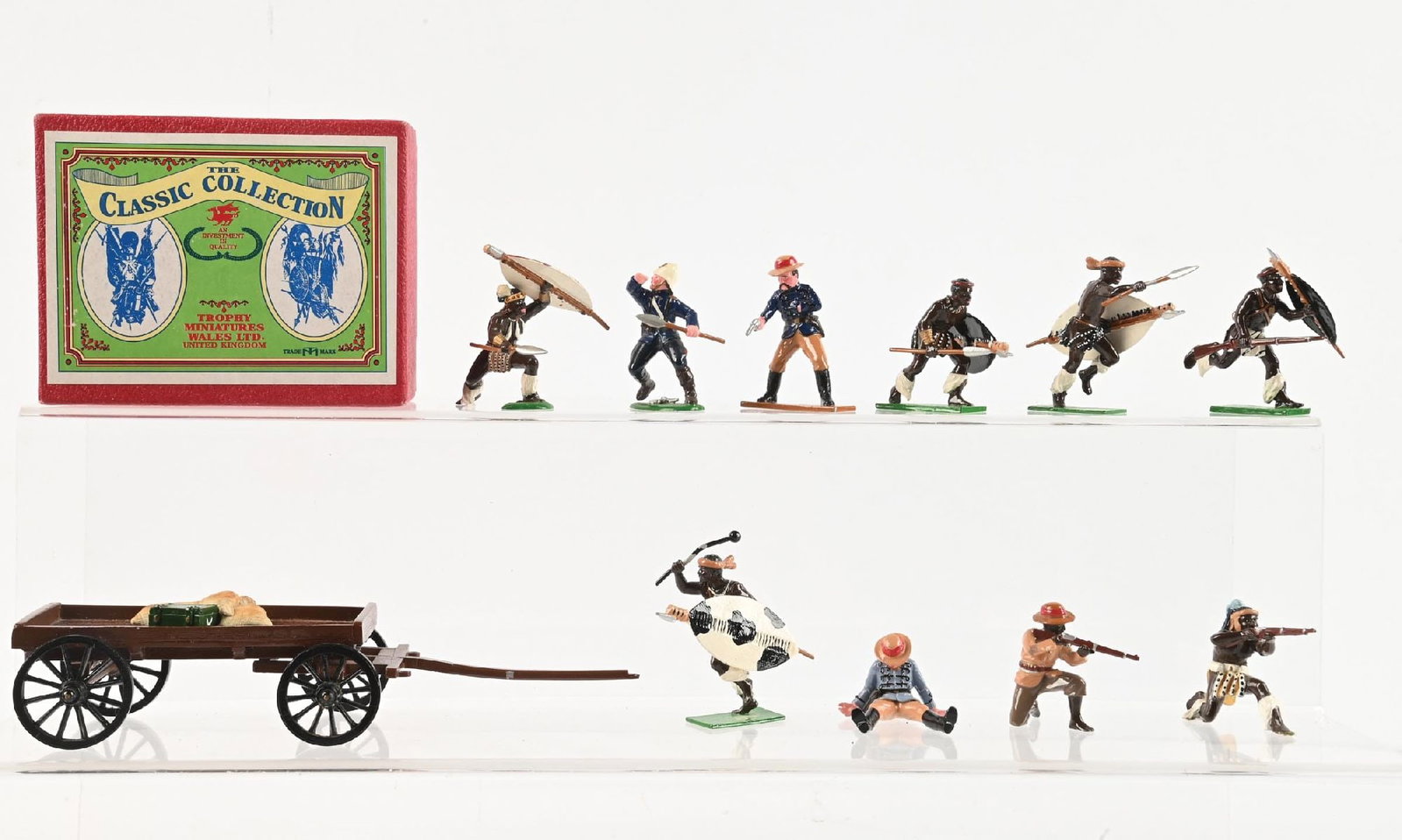 TROPHY ZULU WARS: (A) Hand-to-hand No. H26A. 2 pieces. (B) Wagon, Mealie bags, and Wounded. 4 pieces. (C) Zulus. 6 pieces. 12 pieces total. Condition: Dimensions: Largest: 5" x 4" x 3 - 1/2".