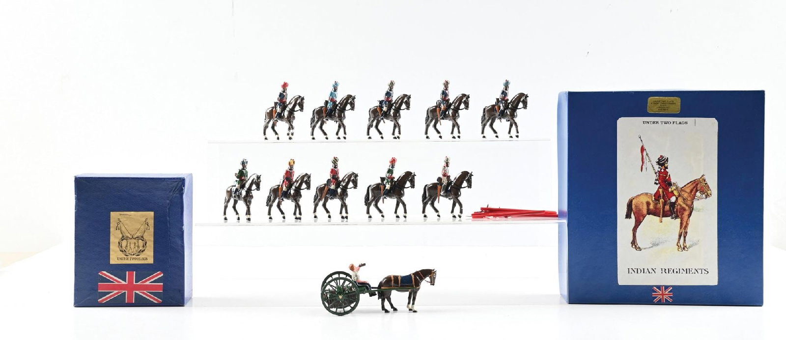 LOT OF 2: UNDER TWO FLAGS TOY SOLDIER SETS IN ORIGINAL BOXES: (A) Under Two Flags / Trophy Mounted Indian Regiment. 10 pieces. (B) Under Two Flags Zulu War Horse-Drawn Water Wagon. 3 pieces. 13 pieces total. Condition: Dimensions: Largest Box: 10 - 1/4" x 9 - 1/