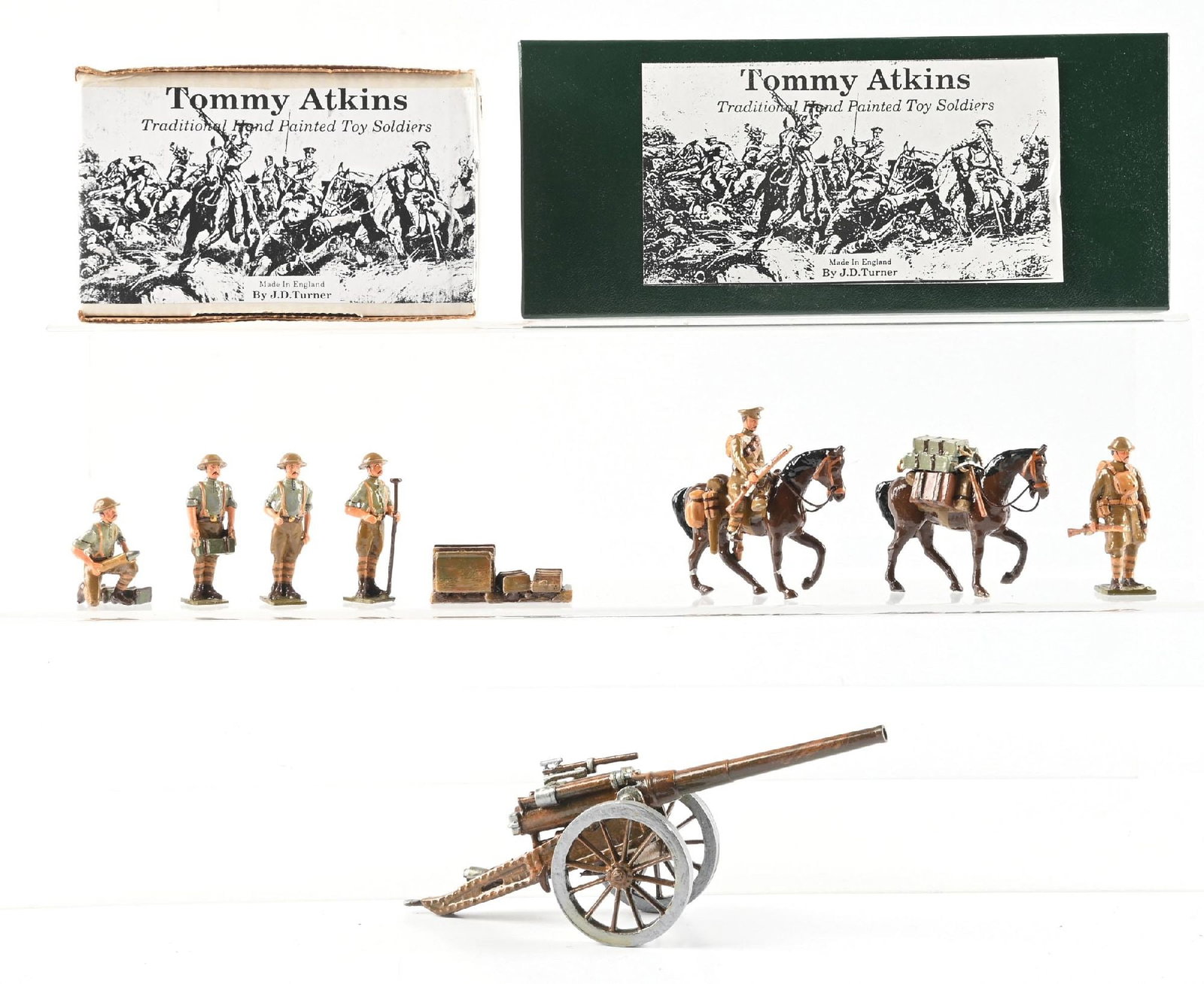 LOT OF 2: TOMMY ATKINS TRADITIONAL HAND-PAINTED TOY SOLDIER SETS IN BOXES: (A) WWI Supply Horse Troop and Officer. 3 pieces. (B) Long-Range Cannon with Crew and Ammunition. 6 pieces. 9 pieces total. Condition: Dimensions: Largest Box: 8" x 6" x 4".