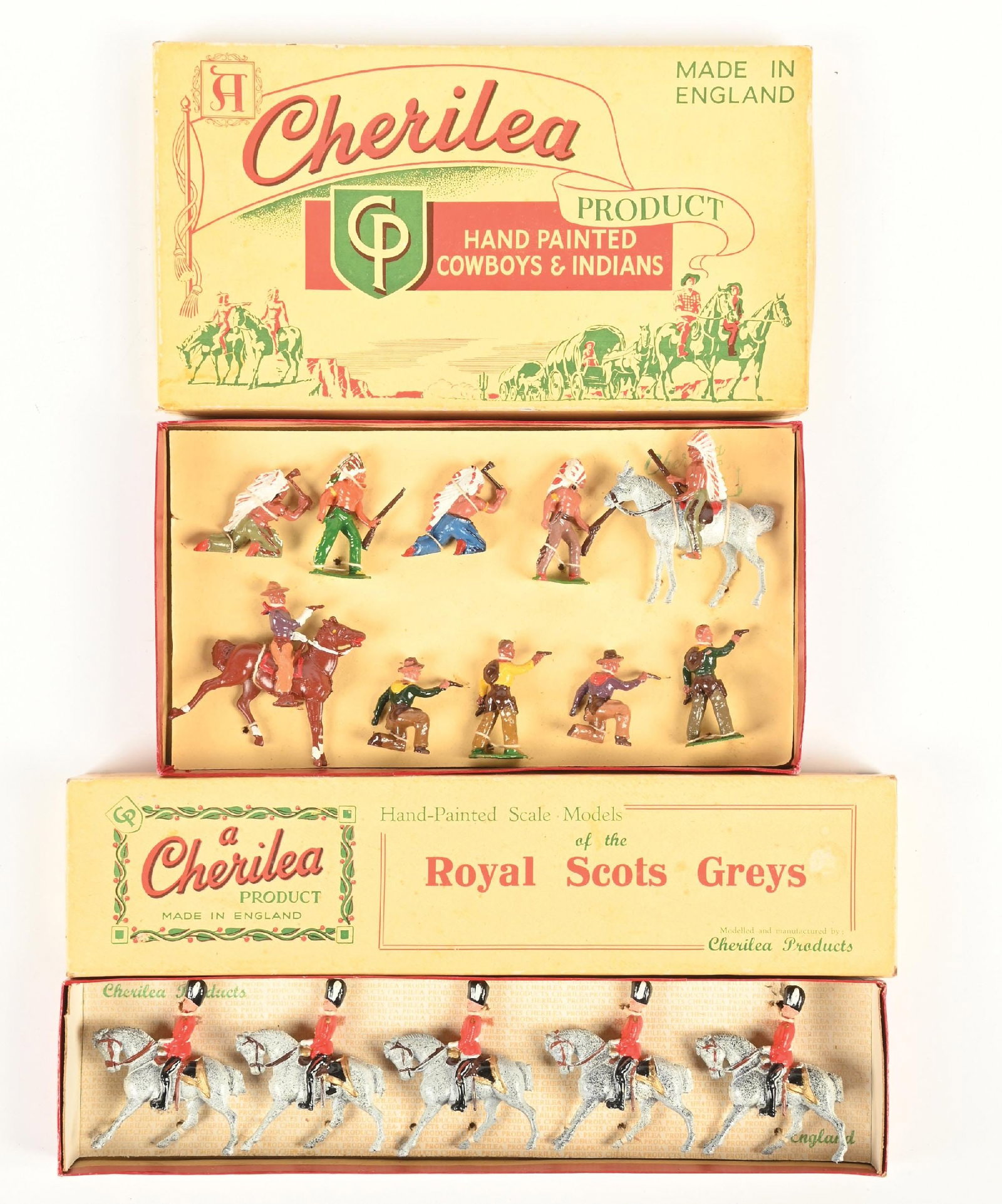 LOT OF 2: CHERILEA SCALE MODELS IN BOXES: (A) Royal Scots Greys. Original tied in the box. 5 pieces. (B) Cowboys & Indians. Original tied in the box. 10 pieces. 15 pieces total. Condition: Dimensions: Largest Box: 11 - 1/4" x 6 - 1/4" x 1".