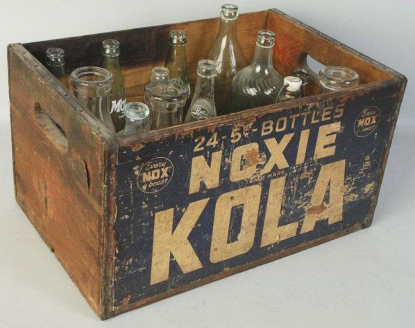 Hoxie Kola Crate & 17 Assorted Bottles.: Bottles include a Hoxie straight side, two Simpson Spring, and others. Crate has nice paper label sides and lighter than average wear. Conditi