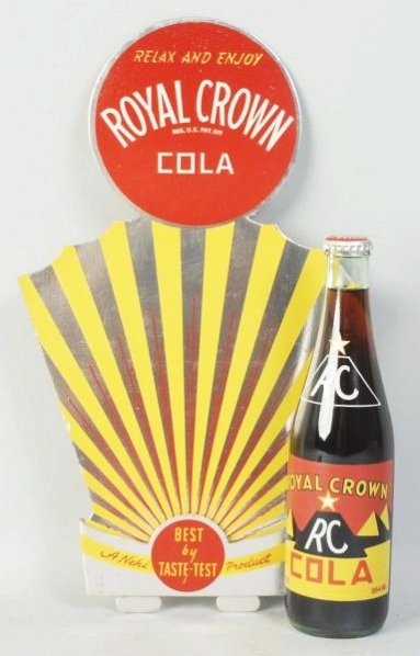 1950s RC Cola Fan Bottle Display & Later Bottle.: Light surface and edge wear on the display. Condition (Excellent). Size Largest: 14" T.
