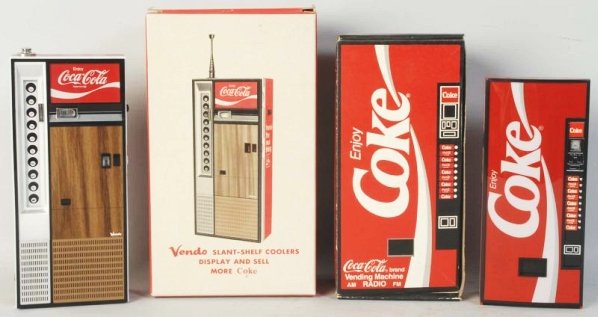 Lot of 2: 1960s-70s Coca-Cola Transistor Radios.: Original boxes with some dust, otherwise radios are unused. Condition (Near Mint). Size Largest Box: 9 - 1/2" T.