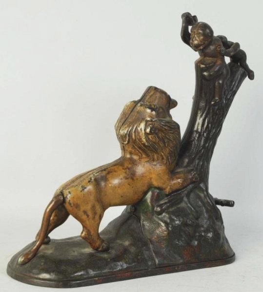 Cast Iron Lion & 2 Monkeys Mechanical Bank.: Manufactured by Kyser & Rex. Working. With replaced small monkey and replaced arm to large monkey. Missing trap. Nice highlights on base. Cond