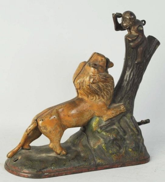 Cast Iron Lion & 2 Monkeys Mechanical Bank.: Manufactured by Kyser & Rex. Missing small monkey and trap. Condition (Very Good - Excellent). Size 9" L.