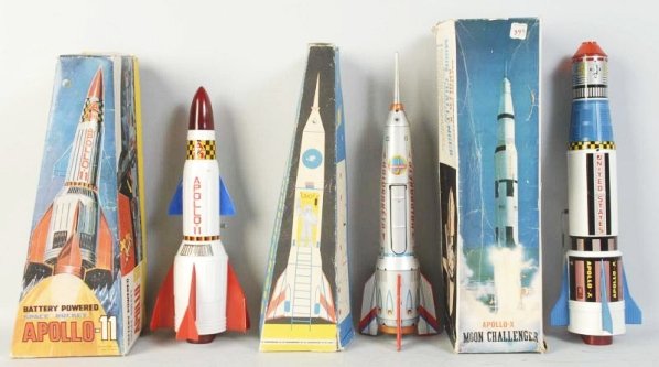 Lot of 3: Vintage Foreign Space Rockets.: Japanese and Hungarian. Tin and plastic. Battery-operated and wind-up. All in original boxes with some creasing and wear. Condition (Very Good