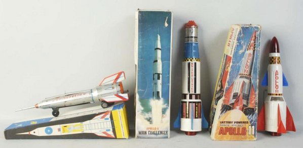 Lot of 3: Vintage Foreign Space Rockets.: Japanese and Hungarian. Tin and plastic. Battery-operated and wind-up. All in original boxes with some creasing and wear. Condition (Very Good