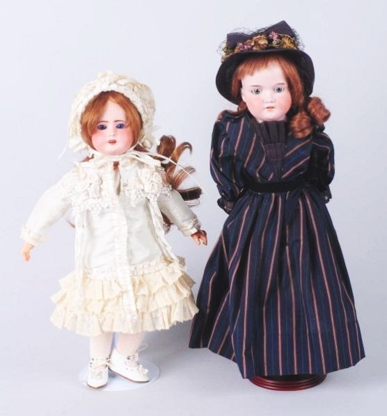 Lot of 2: Antique Dolls.: French Limoges bisque head (very ruddy with lots of speckling), original jointed composition body, nicely redressed in fancy satin and lace; A.M.