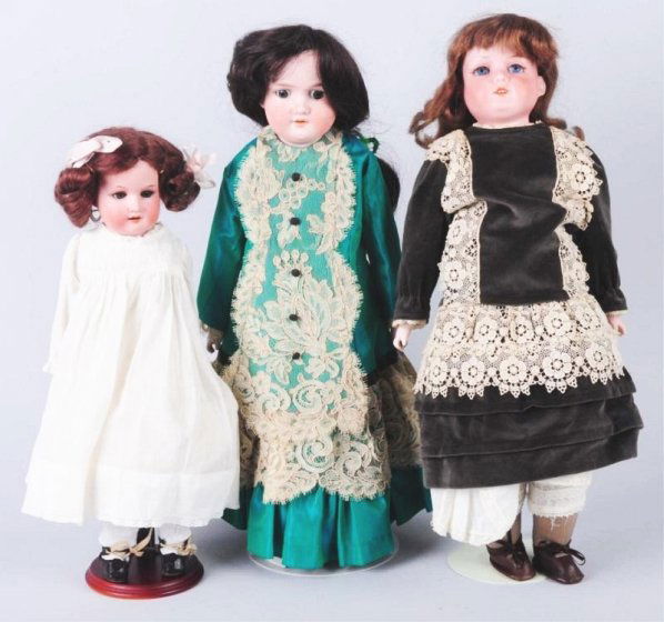 Lot of 3: Antique Dolls.: All with bisque shoulder heads on kidiline bodies (wear, soil); small A.M. 370 with nice wig and clothing; A.M. 370 in green with set eyes (repla