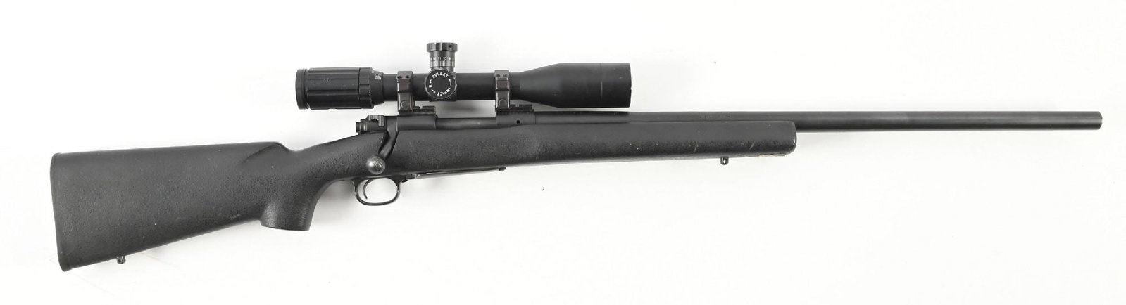 (M) WINCHESTER MODEL 70 STEALTH HEAVY VARMINT BOLT ACTION .223 RIFLE: Rifle features a matte black heavy barrel, black finished push feed Model 70 auction, an unmarked scope, and free floated black pebble textured synthetic stock. Accompanied by its factory box. CONDITI