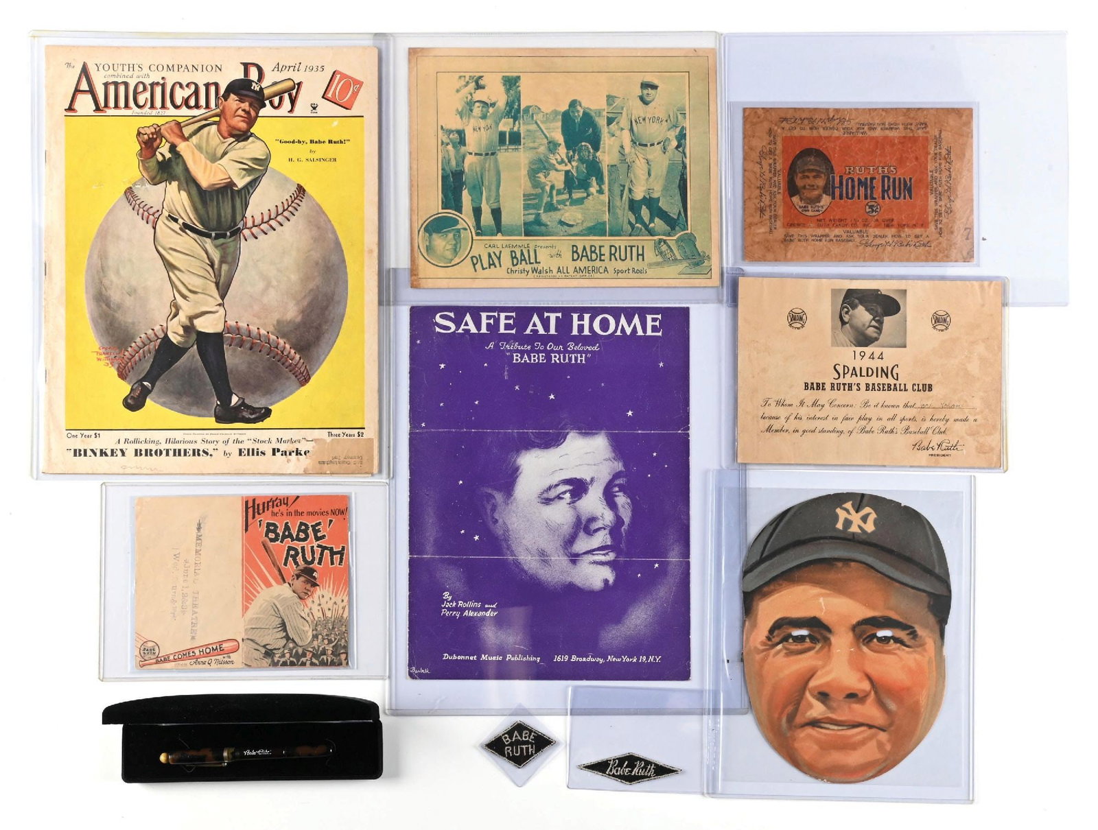 LOT OF 10: BABE RUTH ADVERTISING & EPHEMERA COLLECTION: A collection of Babe Ruth advertising, including a Feen-a-Mint mask, "Babe Comes Home" brochure, two patches, Babe Ruth fountain pen, and more. Condition: (Very Good - Excellent). Dimensions: