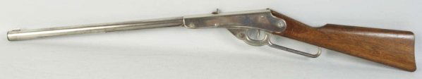 Early Daisy BB Gun Rifle.: Marked "1000 Shot Daisy Model B" on top. Patent date 1904. Condition (Very Good). Size 36" L.