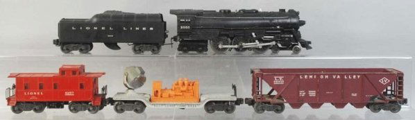 Lionel No. 2055 Freight Train Set.: Post-war. O27-gauge. Set includes no. 2055 steam engine with no. 2048W whistle scoop tender, two freight cars, and no. 6257 caboose. Includes partial engine and tender boxes. Thisis probably not a cat