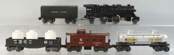 Lionel No. 1110 Freight Train Set.: Post-war. O27-gauge. Includes engine, tender, two freight cars, and no. 6457 caboose. Condition (Very Good).