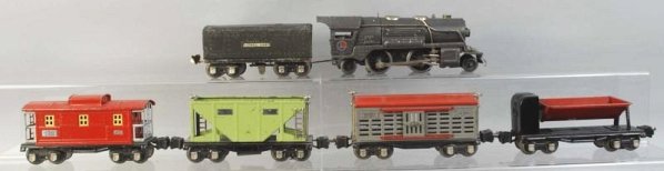 Lionel No. 259 Freight Train Set.: Pre-war. O-gauge. Includes engine, tender, three 2600 series freight cars, and no. 2657 caboose. Some scratching and wear throughout. Condition (Very Good).