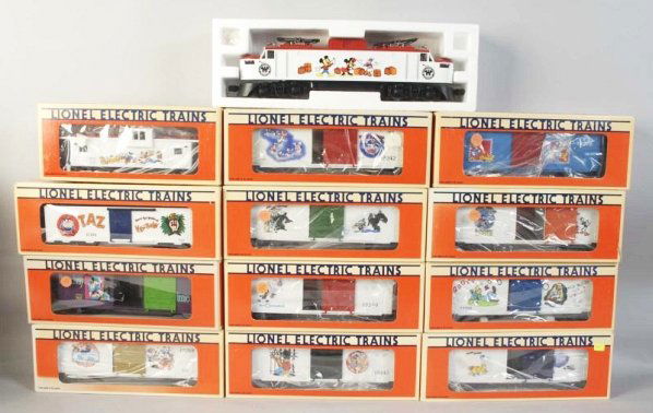Lionel Disney Train Set.: Contemporary. Includes 6-8311 engine, ten Disney boxcars, one Warner Bros. boxcar, and one Disney caboose. Includes all original boxes with some fading. Condition (Excellent).