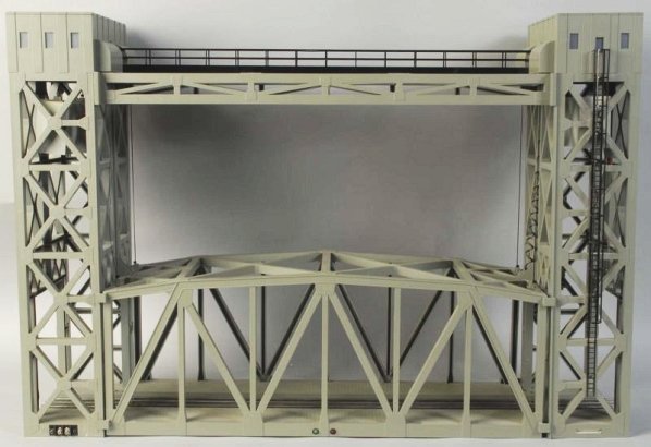 Plastic Lionel Train Bridge Unit.: Contemporary. Includes a Lionel power unit to raise and lower lifts. Condition (Very Good - Excellent).