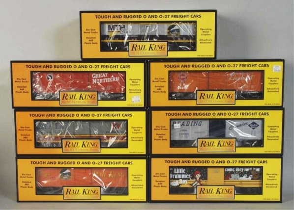 Lot of 7: MTH Rail King Train Boxcars.: Contemporary. Includes Lehigh Valley, The Little Drummer Boy, and others. Includes all original boxes. Condition (Near Mint).