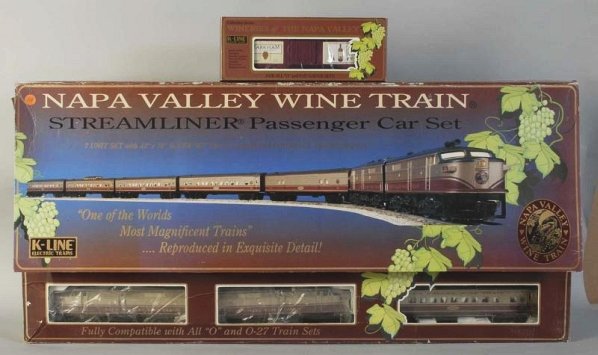 K-Line Napa Valley Passenger Train Set.: Contemporary. Includes Twin A ALCO units, five passenger cars, and one extra Markham Vineyards boxcar. Includes original set box with some creasing and tearing. Condition (Excellent).