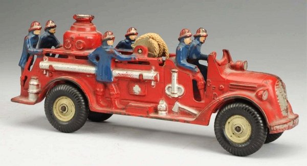 Cast Iron Arcade Fire Pumper Truck Toy.: American. Marked "CFD" on both sides of front. Black rubber tires and six molded firemen. Original hose reel but nozzle is missing. Some paint loss and wear, mostly to running boards and fenders. Cond