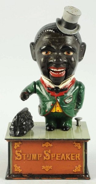 Cast Iron Stump Speaker Mechanical Bank.: Manufactured by Shepard Hardware Company. Working. Early repaint. Condition (Excellent). Size 9 - 3/4" T.