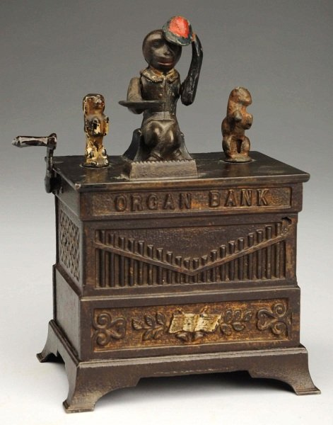 Cast Iron Organ Cat & Dancing Dog Mechanical Bank: Manufactured by Kyser & Rex. Working. Condition (Very Good). Size 7 - 1/2" T.