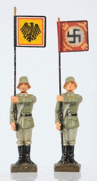 Lot of 2: Lineol German Army Standing Bearers.: Two different flags are shown. Condition (Excellent).
