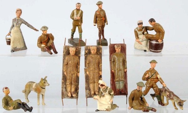 Lineol 9 cm Medical Figures.: Mostly U.S. soldiers, with one German nurse. There are two nice duplexes and two medical dogs. Two stretchers are rough. Condition (Good - Very Good).